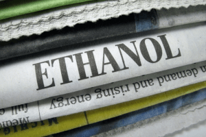 the word ethanol typed on a stack of newspapers